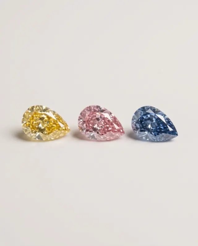 Yellow, pink and blue pear shape fancy color diamonds