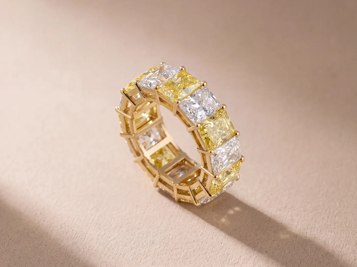 Radiant cut diamond eternity band in 18K yellow gold