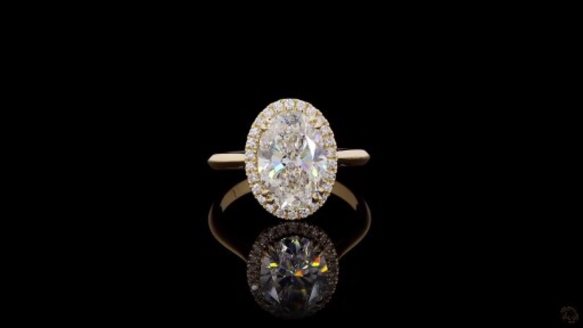 Finished custom engagement ring, 14KY gold with oval halo