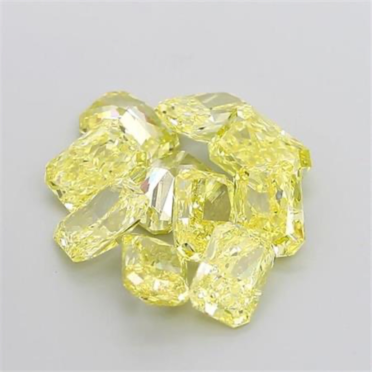 Calibrated fancy yellow cushion melee parcel