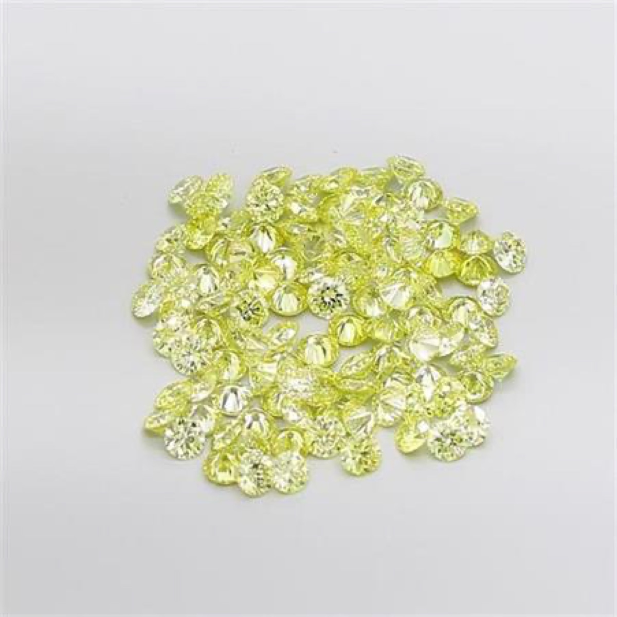 Calibrated fancy yellow round melee parcel