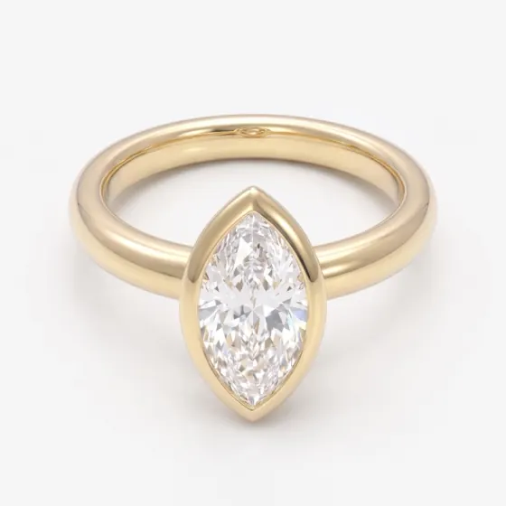 Marquise diamond in a yellow gold bezel ring