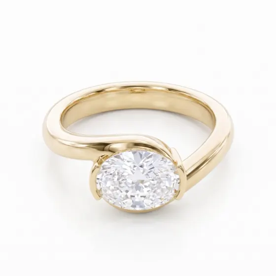 Yellow gold oval solitaire ring on a bypass band