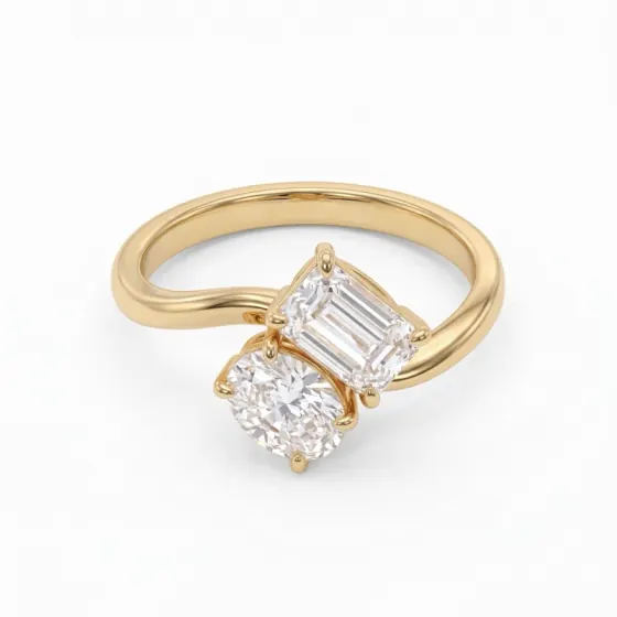 Toi et moi ring with emerald cut and oval diamonds