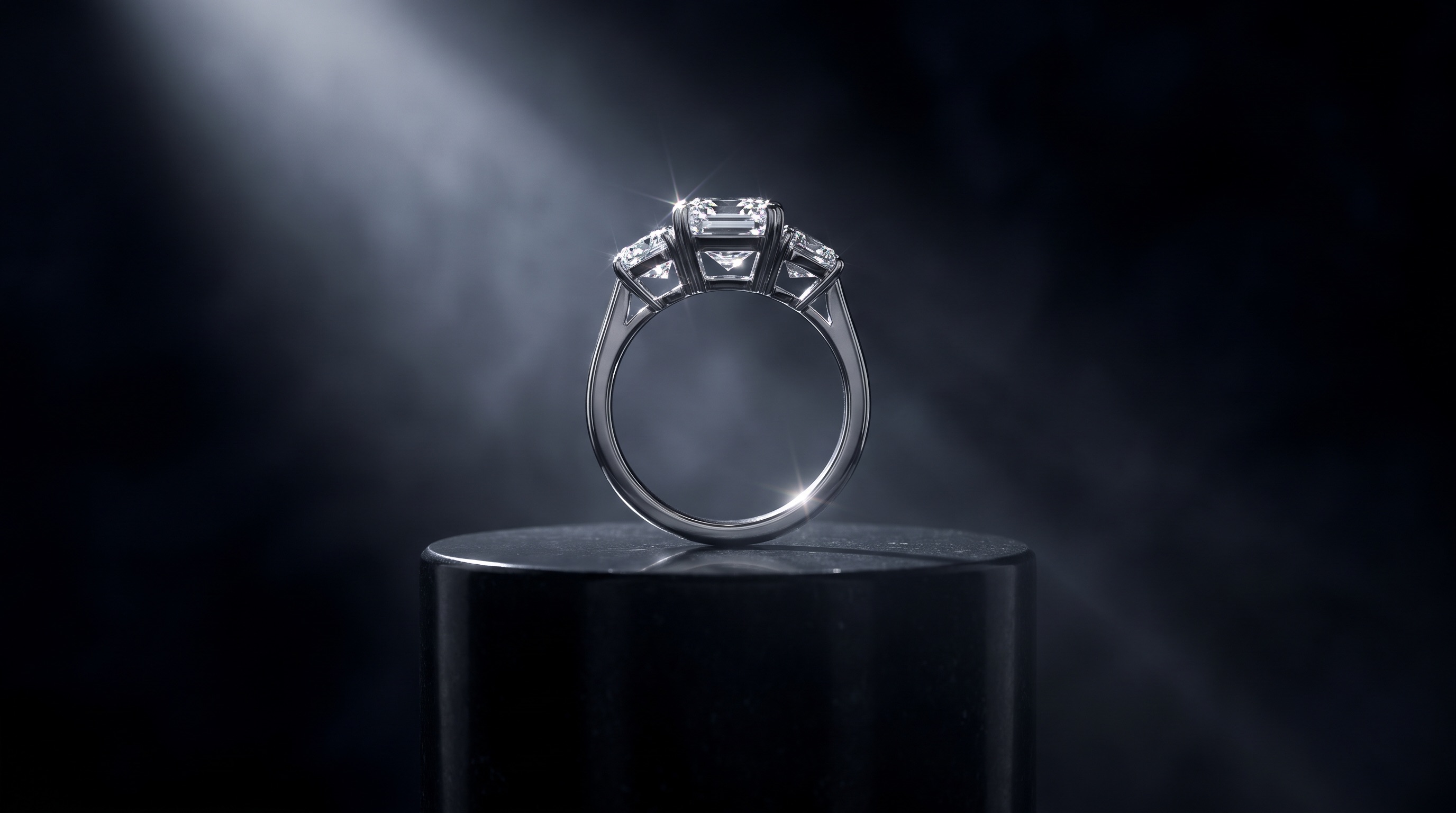 Loose shield cut diamonds arranged in graduated sizes, calibrated matching set for a halo ring build