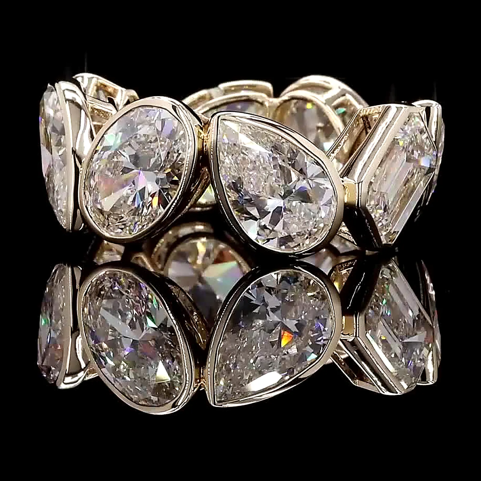 Bezel-set mixed-shape diamond eternity band, 14K yellow gold, 13.67 ct total