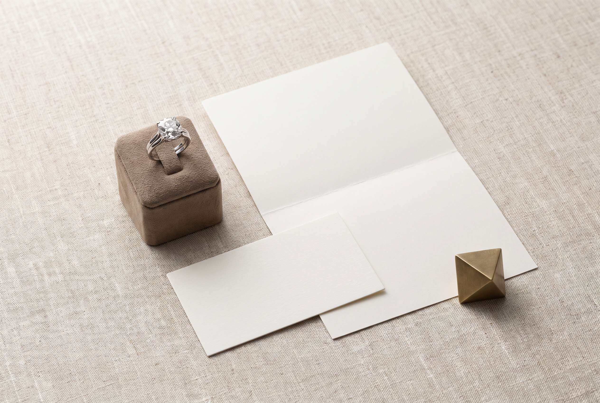Loose lab-grown diamonds and calibrated melee staged together on a linen-draped tray before a single consolidated wholesale shipment