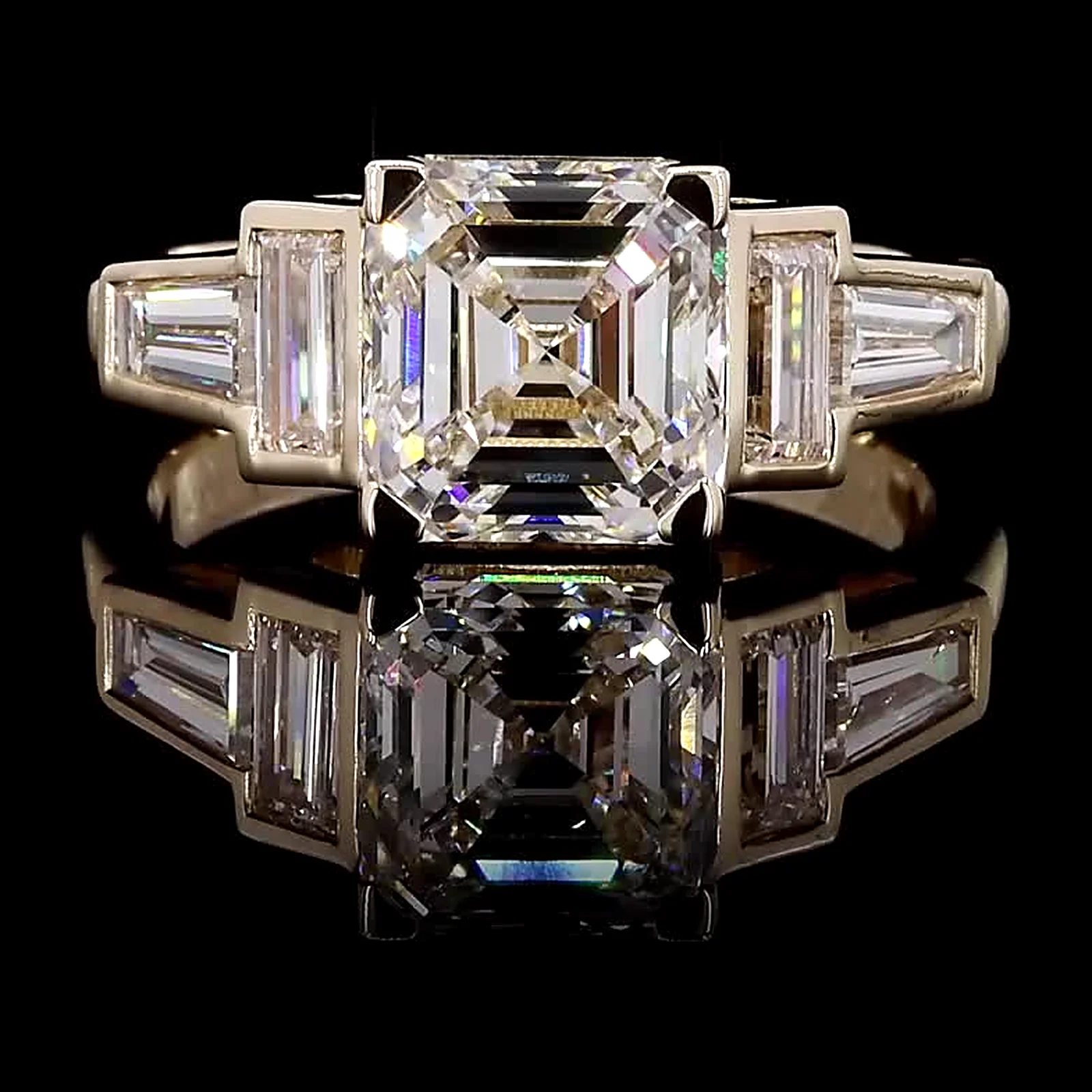 Asscher-cut diamond three-stone ring with baguette side diamonds, 14K yellow gold, 4.03 ct total